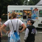 two people in front of ice cream truck