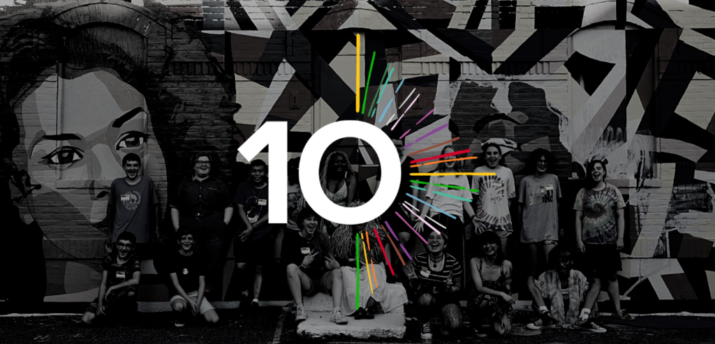 Logo of the number 10 over a b/w image of youth outdoors