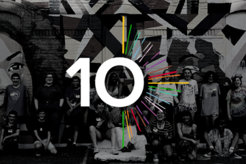 Logo of the number 10 over a b/w image of youth outdoors